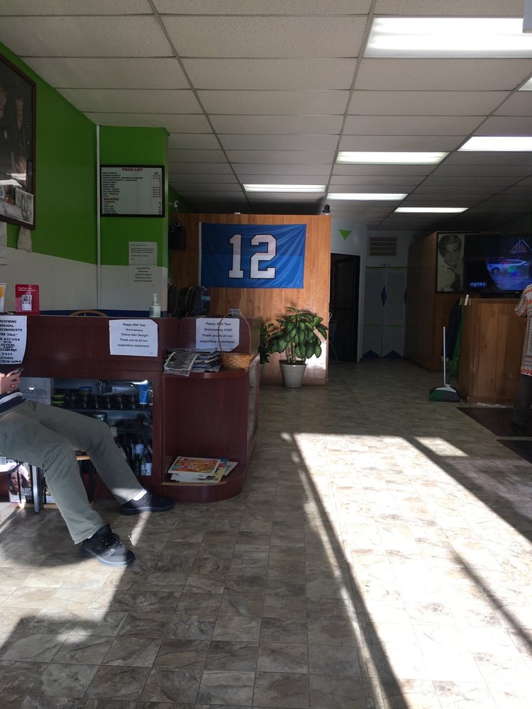 Front counter with Seahawks flag at Cherry Hair Design, Seattle