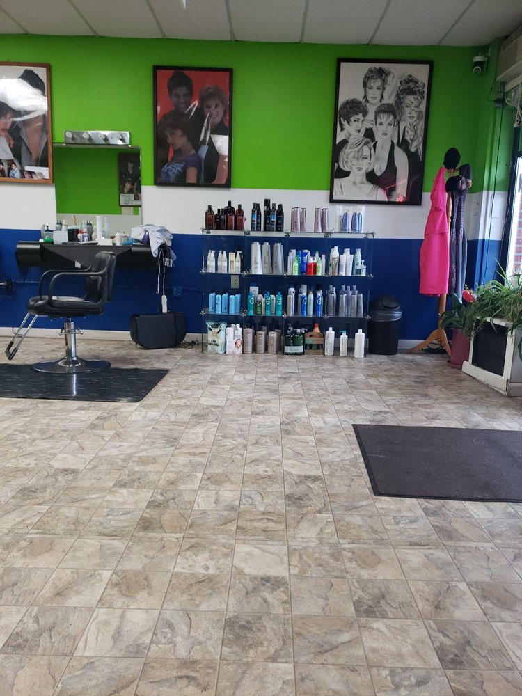 Styling station and product shelf at Cherry Hair Design